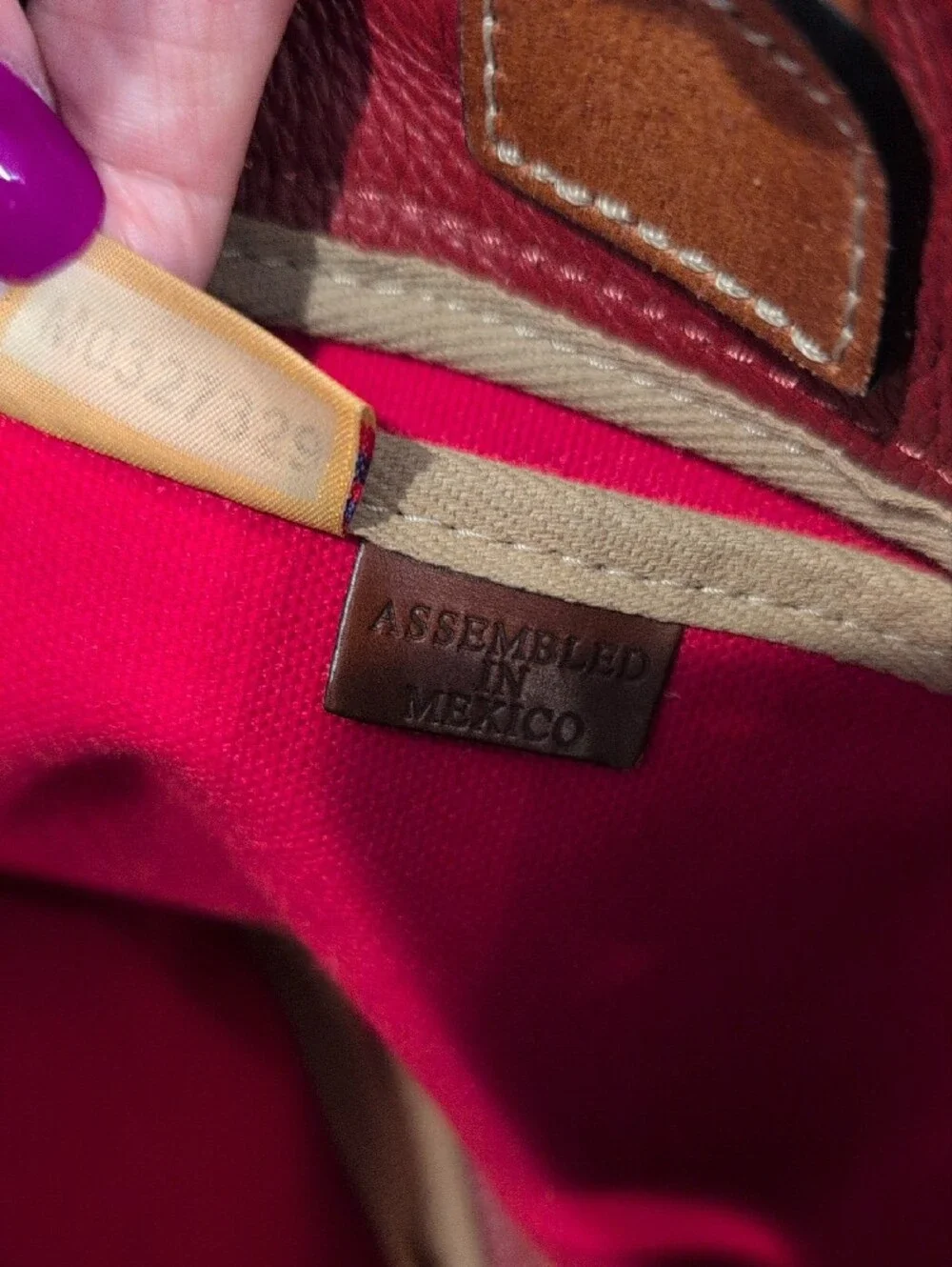 Dooney & Bourke Tassel Drawstring Pebbled Leather Satchel Bag